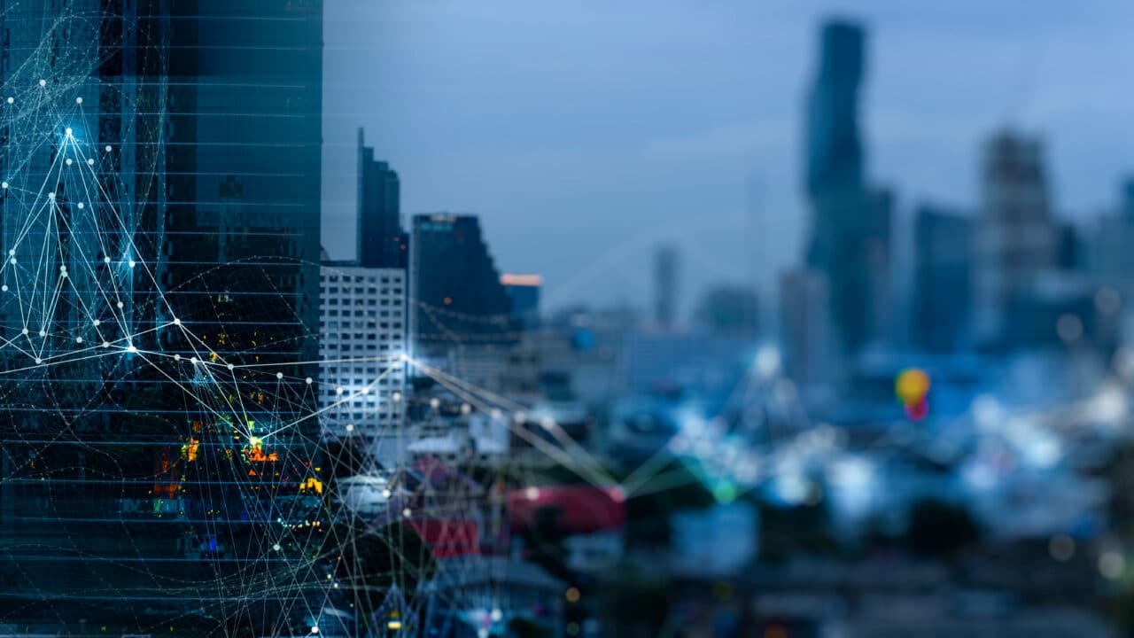 Wireless network and Connection technology concept with Abstract buildings and city background