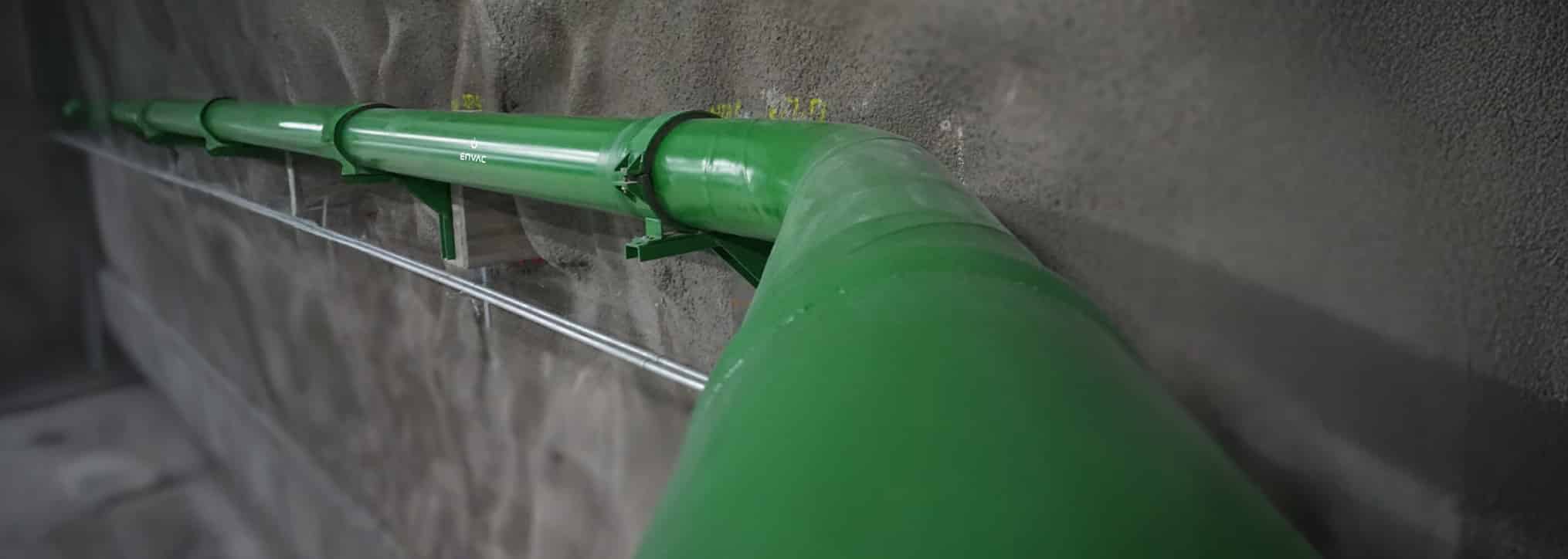 Underground waste collection pipes installed in a culvert